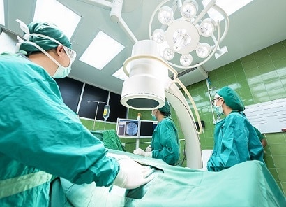 Group of Surgeons in Operating Theatre